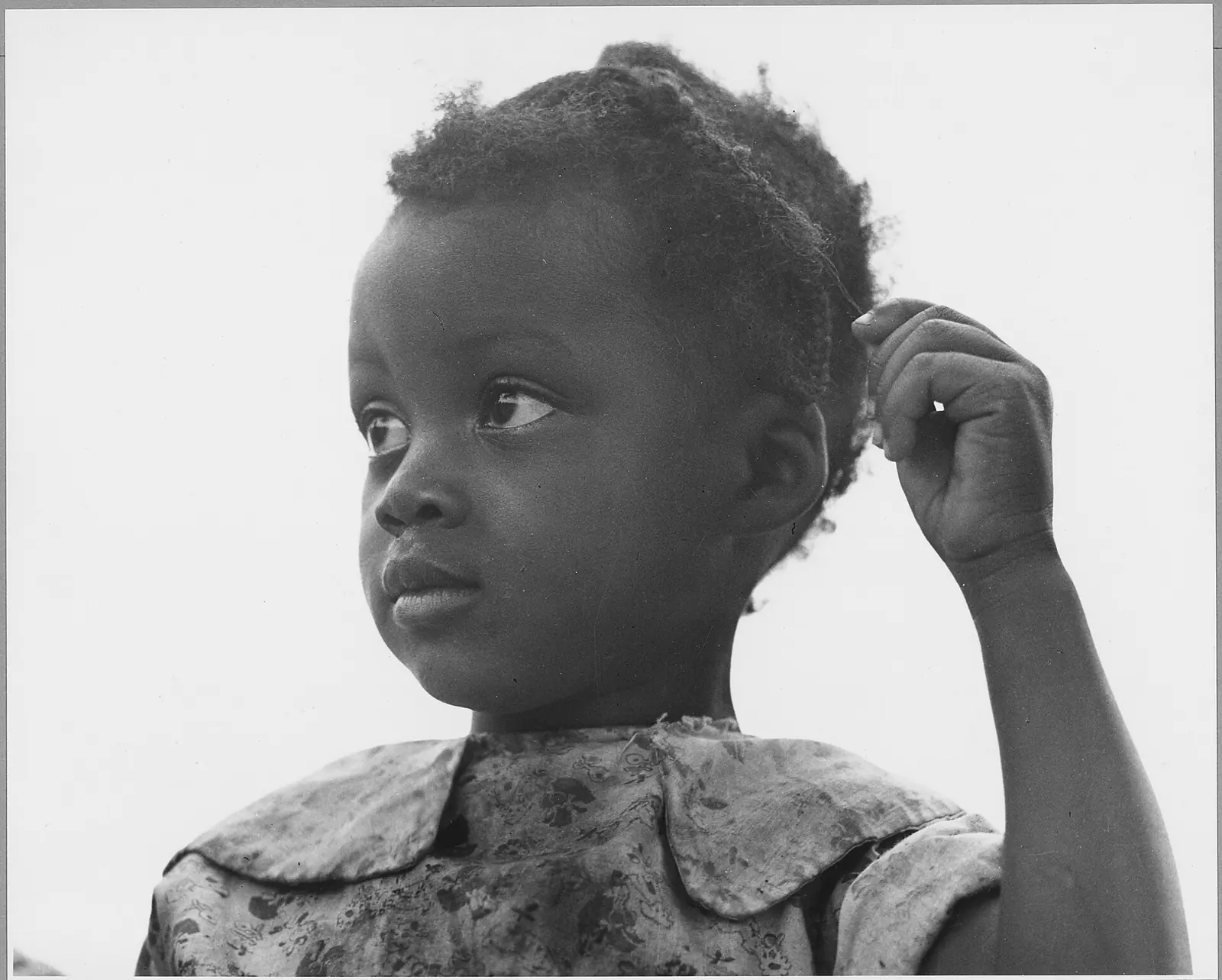 Children singing and playing together at a community program
